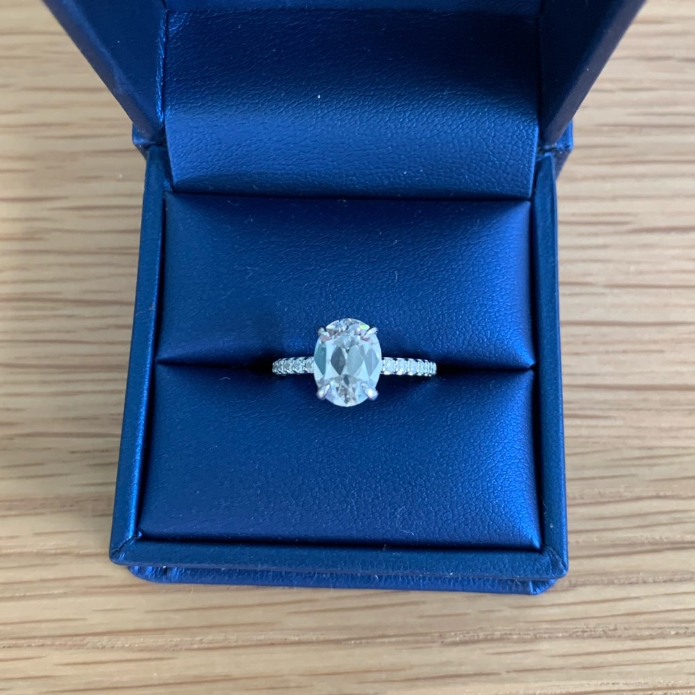 Moissanite & Co engagement ring. VS quality diamonds on sides. 4.75 size.